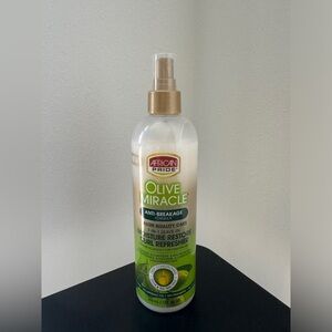 African Pride Olive Miracle Anti-Breakage formula Curl Refresher. NEW!